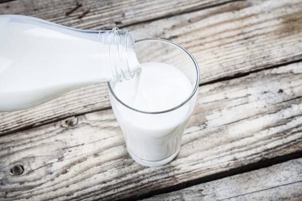 Milk being poured into a glass