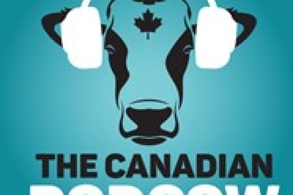 A cow face wearing headphones