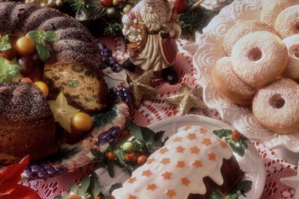 Sliced fruit cake with candied fruit and nuts