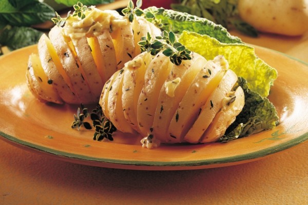 herb buttered new potatoes hot off the grill