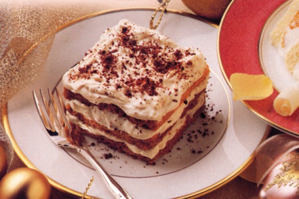 Classic tiramisu with Canadian mascarpone and espresso, layered and dusted with chocolate for an authentic dessert.
