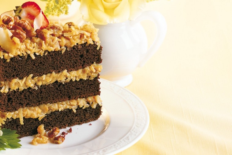 Triple-layer German chocolate cake layered with creamy frosting, coconut